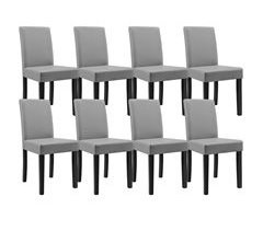 8x sillas tapizadas de piel sintética con patas de mader