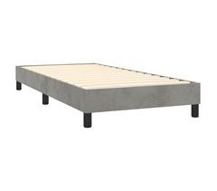 Somier de láminas sobre patas estructura de cama en tela terciopelo
