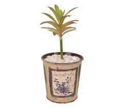 Maceta con planta artificial