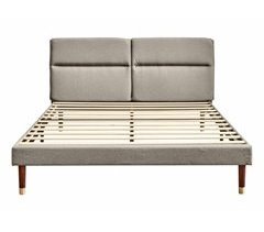 Cama de matrimonio tapizada en tela de lino con cabecero