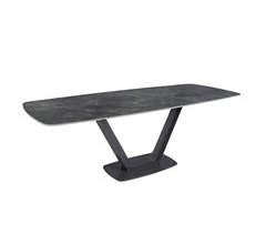 Mesa comedor extensible ovalada barril mármol porcelánico y acero negro
