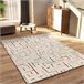 Alfombra de diseño geometrico BERUTI - ATTICGO 133x190 Beige