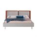 Cama tapizada en tela y polipiel Gris