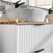 Mueble lavabo individual efecto piedra de Adriel Blanco
